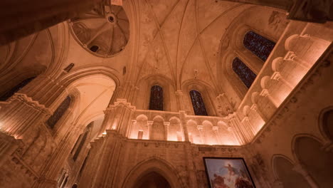 a stunning cathedral interior in church saint-nicolas, blois, france, with warm lighting