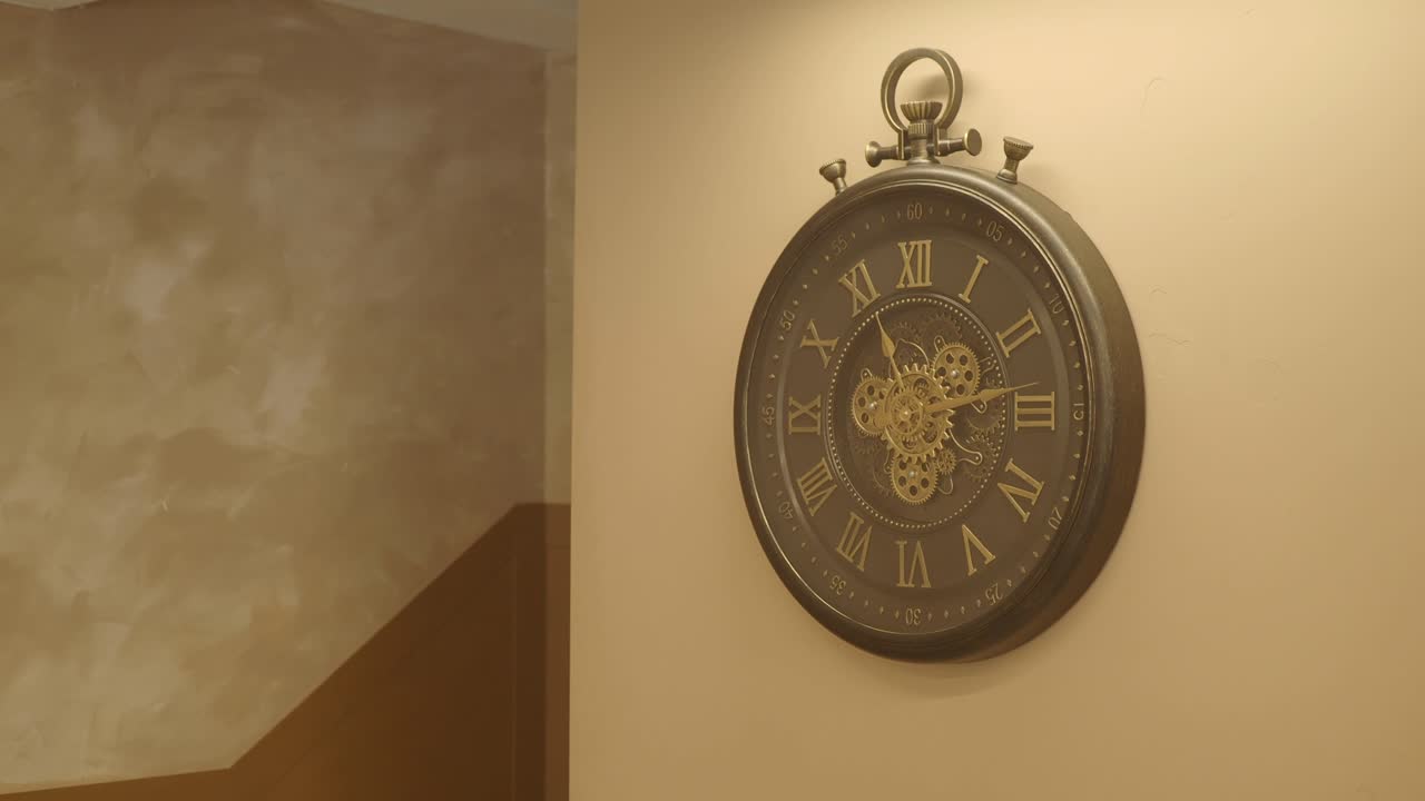 Decorative Wall Clock with Roman Numerals and Exposed Gears