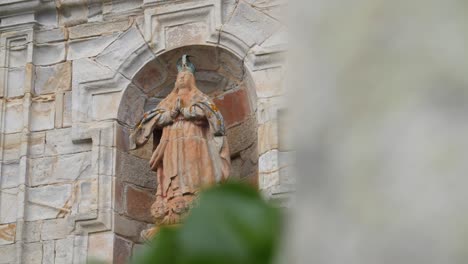 virgin at the facade of the royal monastery of oia in the portuguese way of saint james in oia, galicia