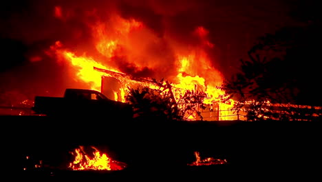 a house burns to the ground at night during the thomas fire in ventura and santa barbara county