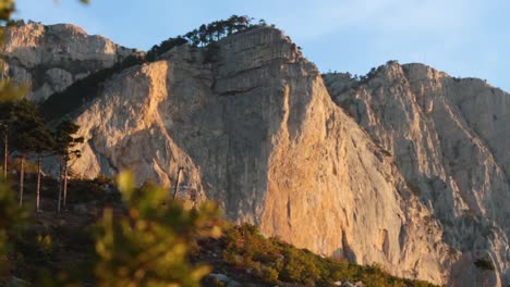 mountain cliff face at sunset