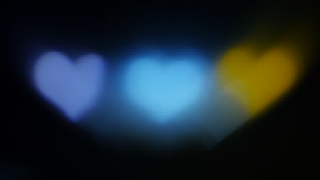 bokeh colorful heart on a black background