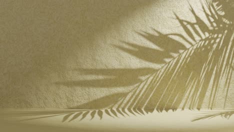 yellow green textured wall with palm frond shadow waving in wind on back