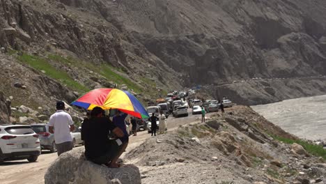 traffic hunza valley rocky coastline dangerous road pakistan southeast asia