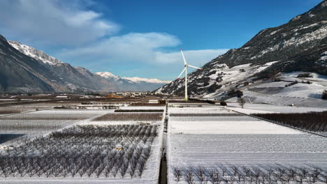 gran molino de viento moderno gira en suiza en un soleado día de invierno