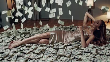 woman lying on a pile of money