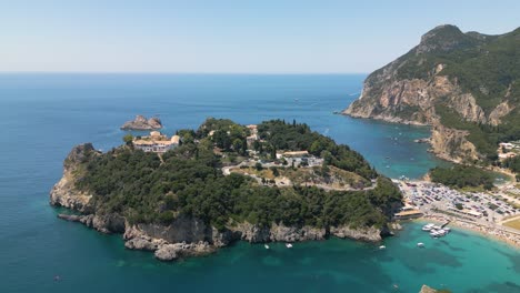 aerial establishing shot of paleokastritsa monastery in corfu, greece