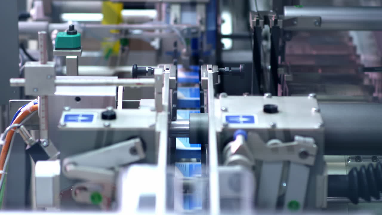 A clean and organized modern medical pharmacy during Automated biopharmaceutical manufacturing packaging line for pharmaceutical products in a factory setting Factory healthcare products