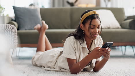 Phone,-relax-and-happy-woman-on-a-floor