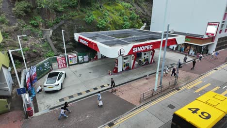 timelapse view of the sinopec gas station in quarry bay, hong kong, highlighting urban landscape and energy infrastructure.