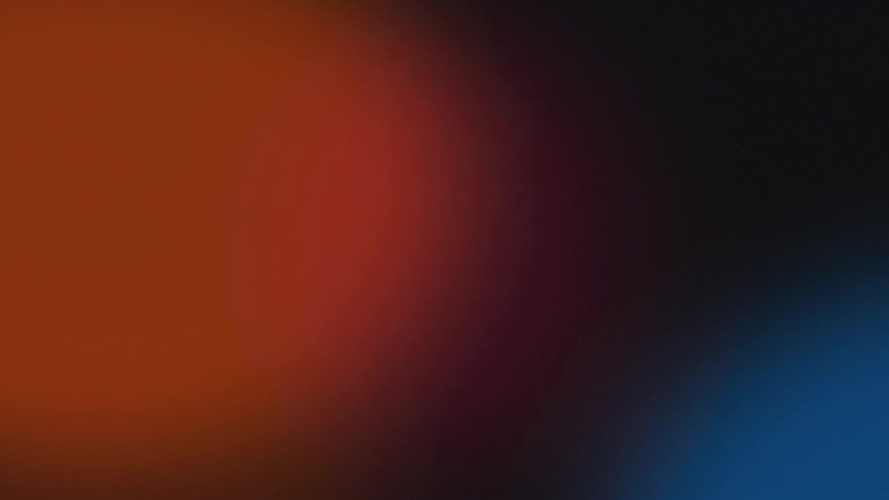 Abstract Background with Soft Orange and Blue Light Leaks