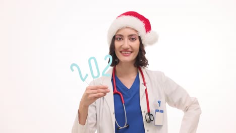 female doctor in santa hat celebrating new year 2023