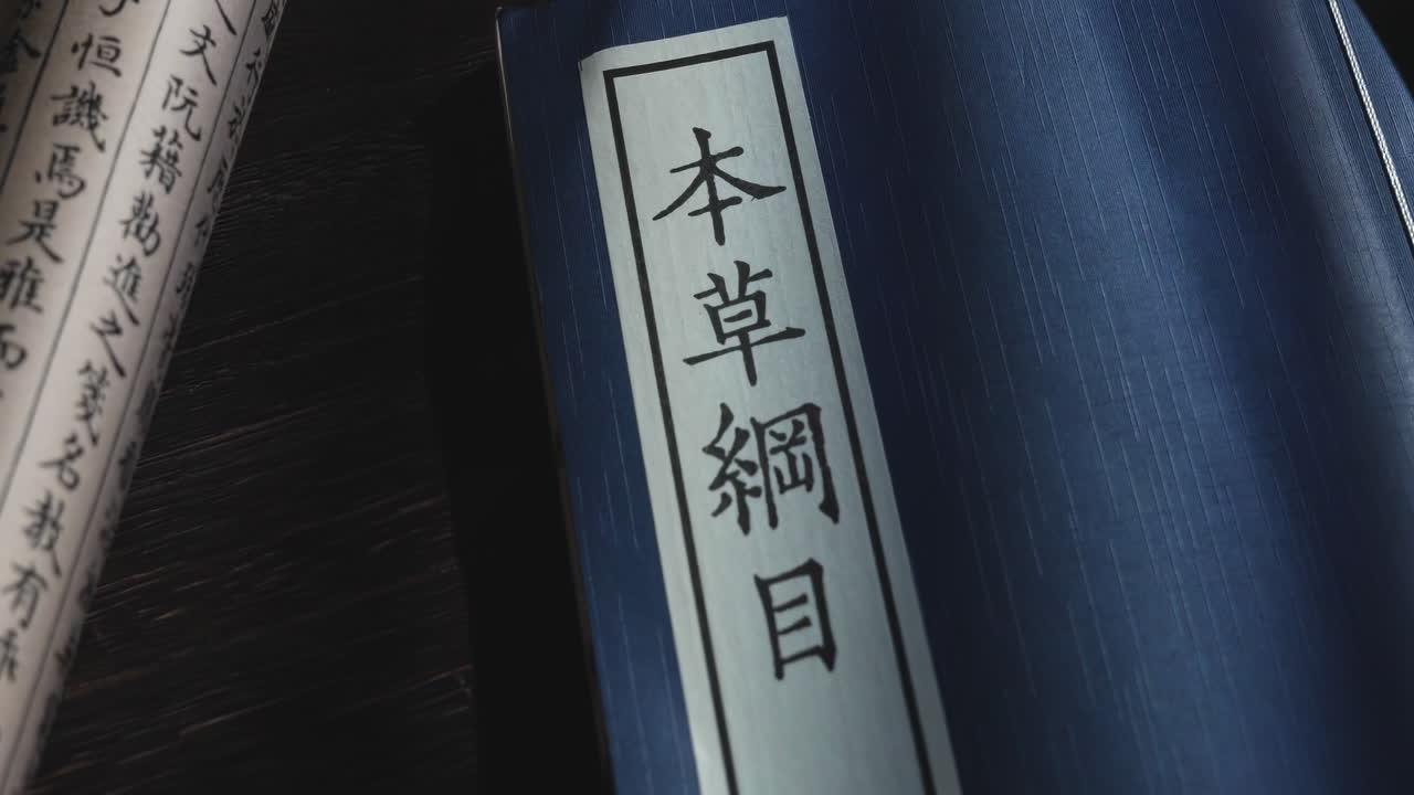 Ancient calligraphy chinese book with aged pages, the original traditional culture Chinese words, preserved in the Temple of Confucius