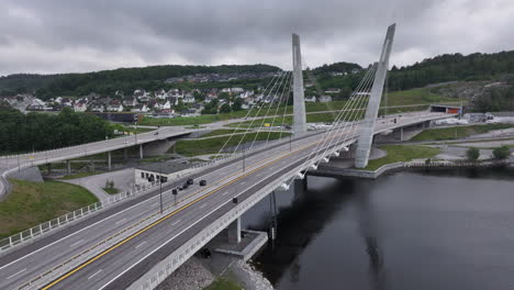 Flying-Towards-The-Farris-Bridge-Against-Overcast-Sky-In-Larvik,-Norway