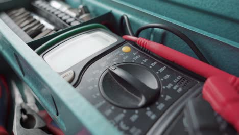 digital multimeter in a tool box. close up