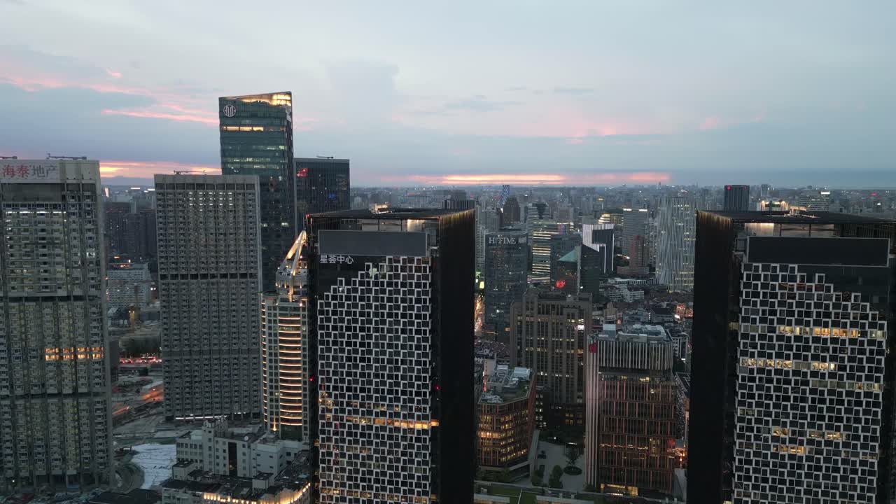 Stunning Aerial View of a Modern City Skyline at Dusk