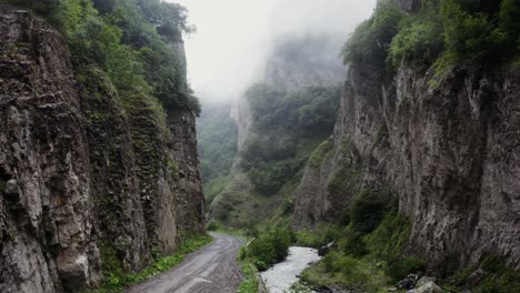 mountain canyon road with fog