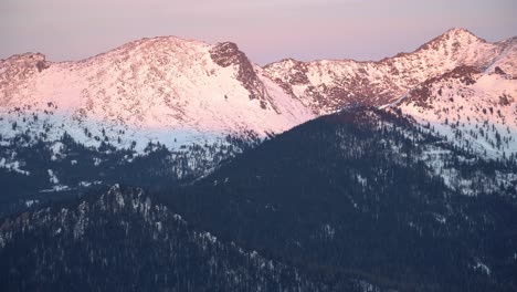 snowy mountain peaks at sunrise