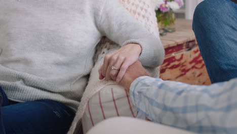 close up old couple holding hands gently touching sharing romantic connection expressing love after long marriage kindness forgiveness concept 4k footage