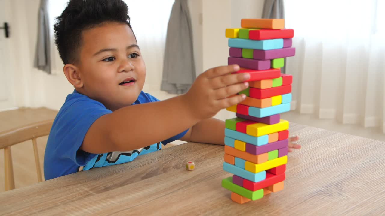 Cute Little Boy Play Color Wood Block Tower Game, Slow Motion