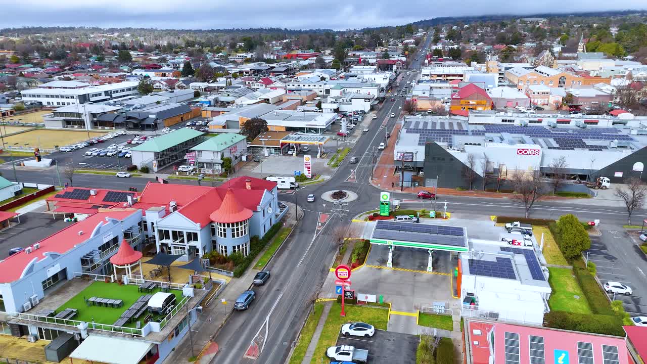 Drone captures vehicles navigating a roundabout in Armidale suburb