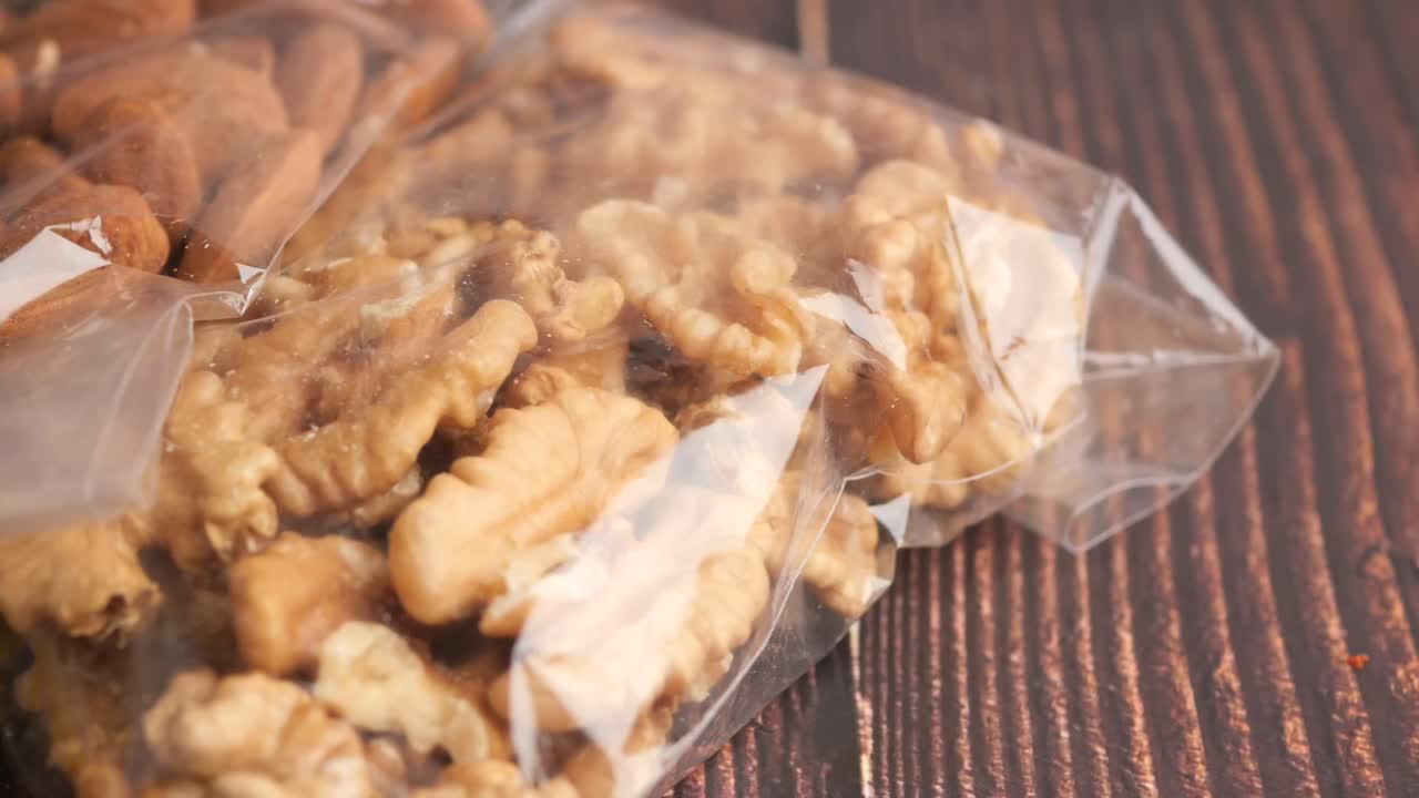 Almonds and Walnuts in Plastic Bags