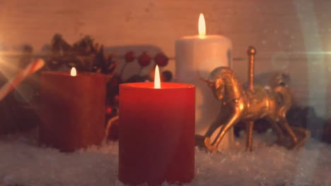 Animación-De-Tres-Velas-Encendidas-Y-Adornos-Navideños.