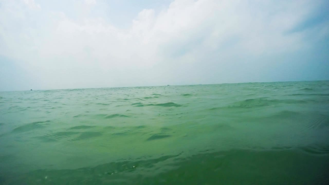 POV of treading water on a vast ocean.