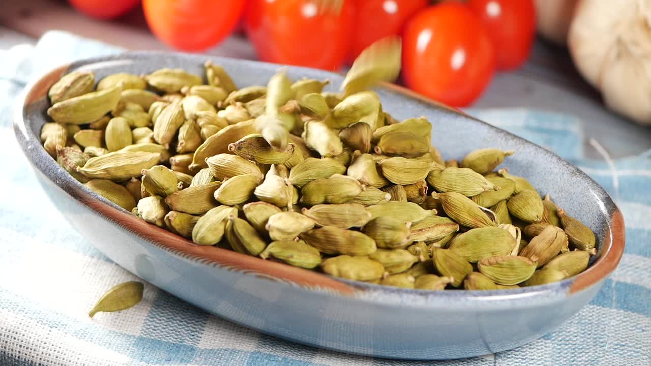 Green Cardamom Pods in Bowl