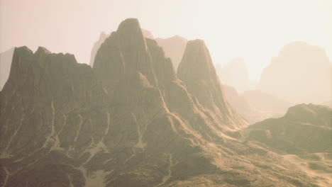 majestic misty mountains rise under the gentle sunlight in a tranquil landscape