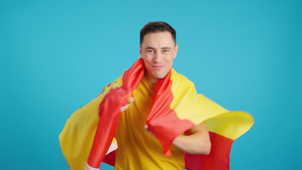 Man wrapped in a Spanish flag