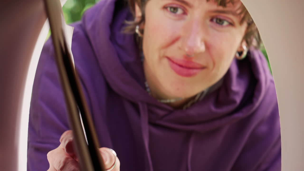 Young Woman Collecting Correspondence from Outdoor Mailbox