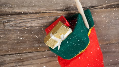 falling snow with christmas stocking