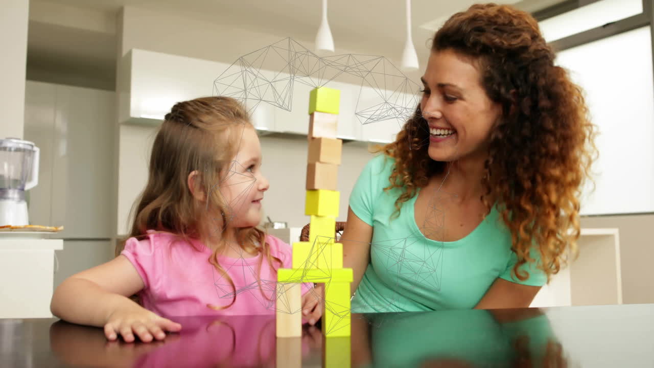 Building blocks with geometric network animation, smiling woman and child in kitchen