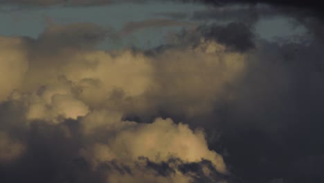 timelapse of rain clouds rolling in on blue sky