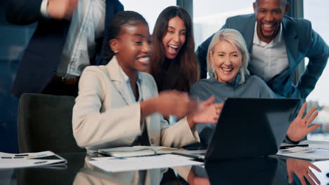 business team celebrating success in the office