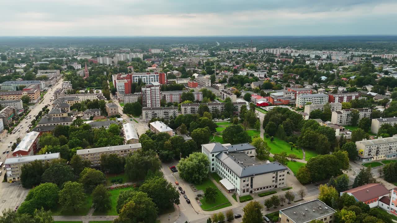 Aerial view of Jelgava, Latvia, showcasing urban landscape and greenery