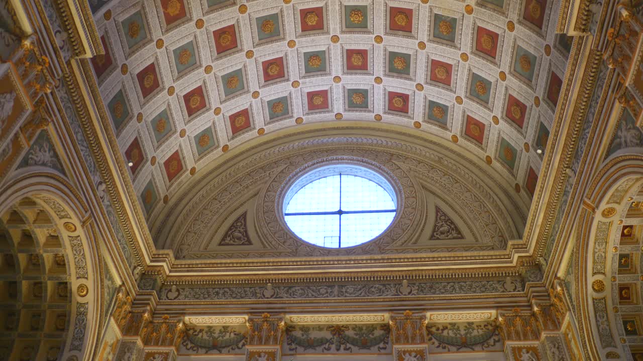 Explore the intricate ceiling and stunning architectural elements of Basilica of Sant'Andrea in Mantova, Italy. Marvel at the historical artwork and serene atmosphere of this magnificent site.