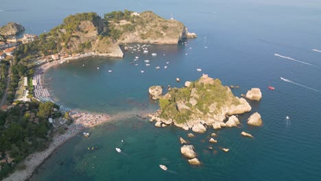 isola bella near taormina in southeast sicily - cinematic drone shot