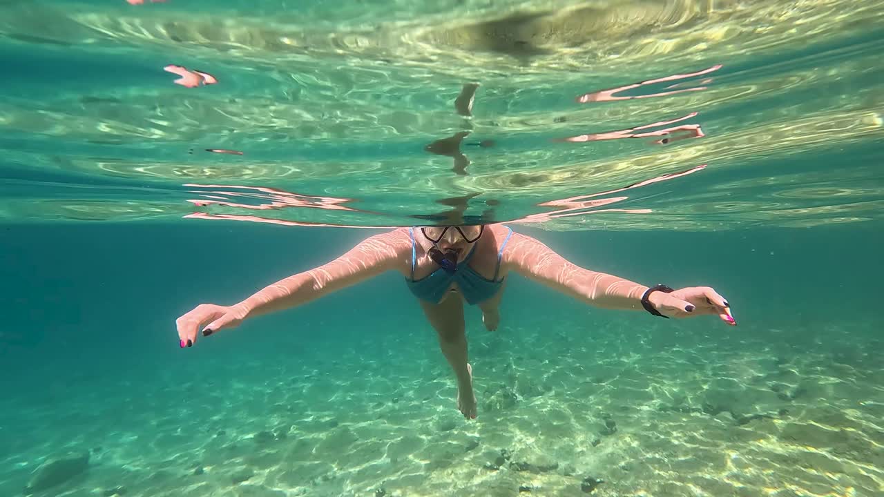 Beautiful Woman in Bikini Swims and Snorkel Adriatic Sea Underwater View. Radmanand Petrcane Beach in Zadar, Dalmatia Croatia. Petrcane Village,Travel Concept