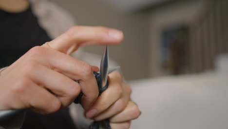 learning to knit. close up, slow motion, low angle.