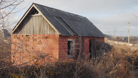 abandoned brick shed in rural area