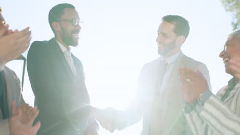 handshake, hug and applause with a business team