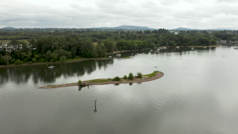 aerial orbit around toe island in the willamette river portland oregon.