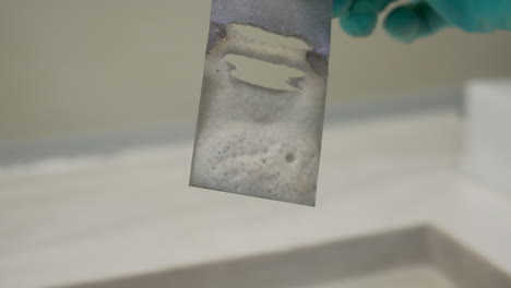 experiment with foam and liquid on a sample