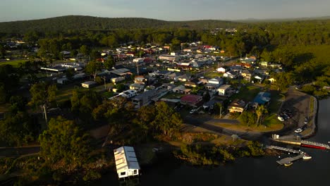 left to right sunrise aerial view of the regional town of karuah, new south wales, australia.