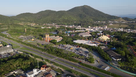 left-tracking drone shot over beto carrero under afternoon sun