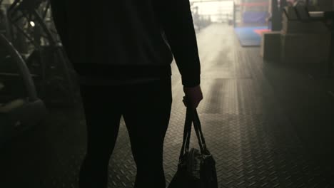 woman leaving gym