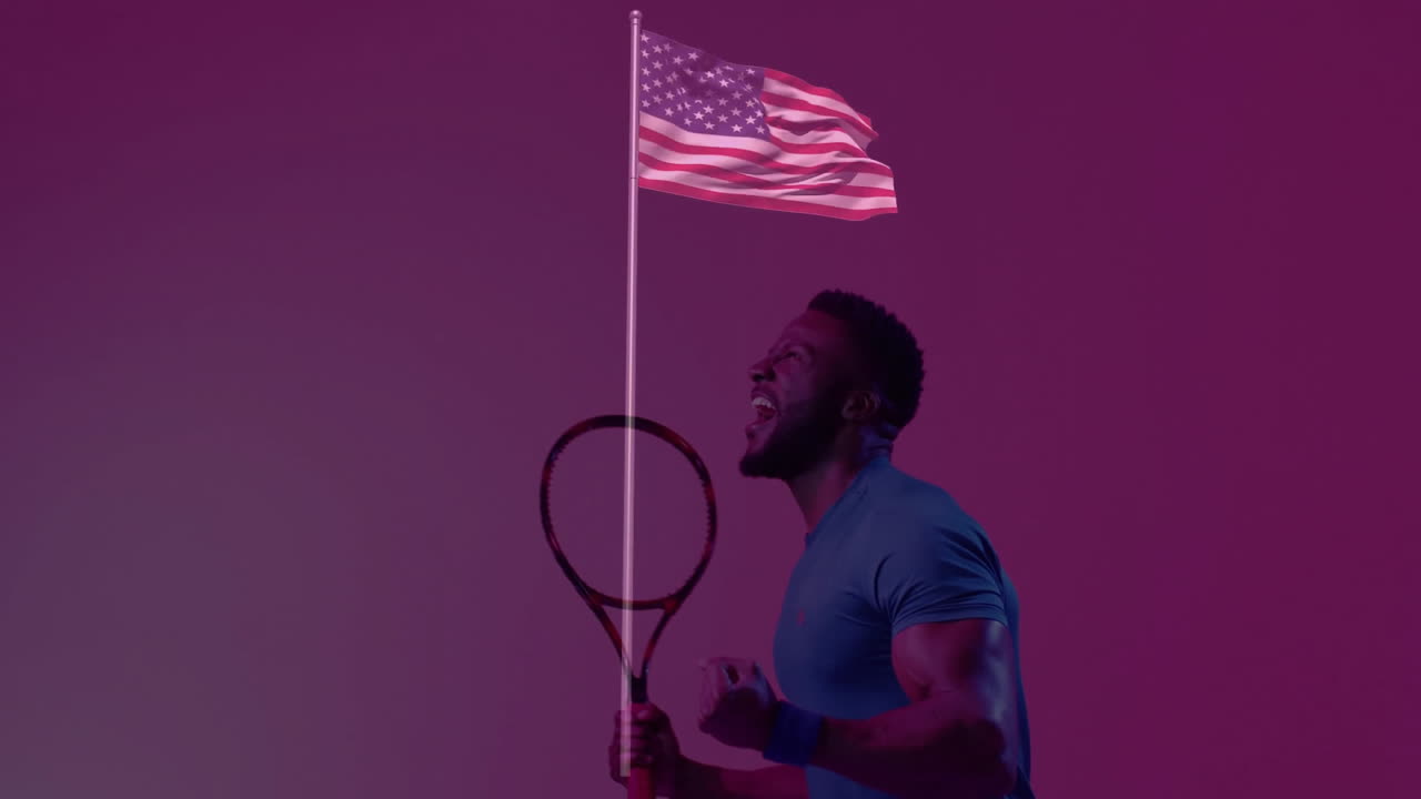 male athlete gripping tennis racket in studio, showing US flag overlay, wristband and health stats