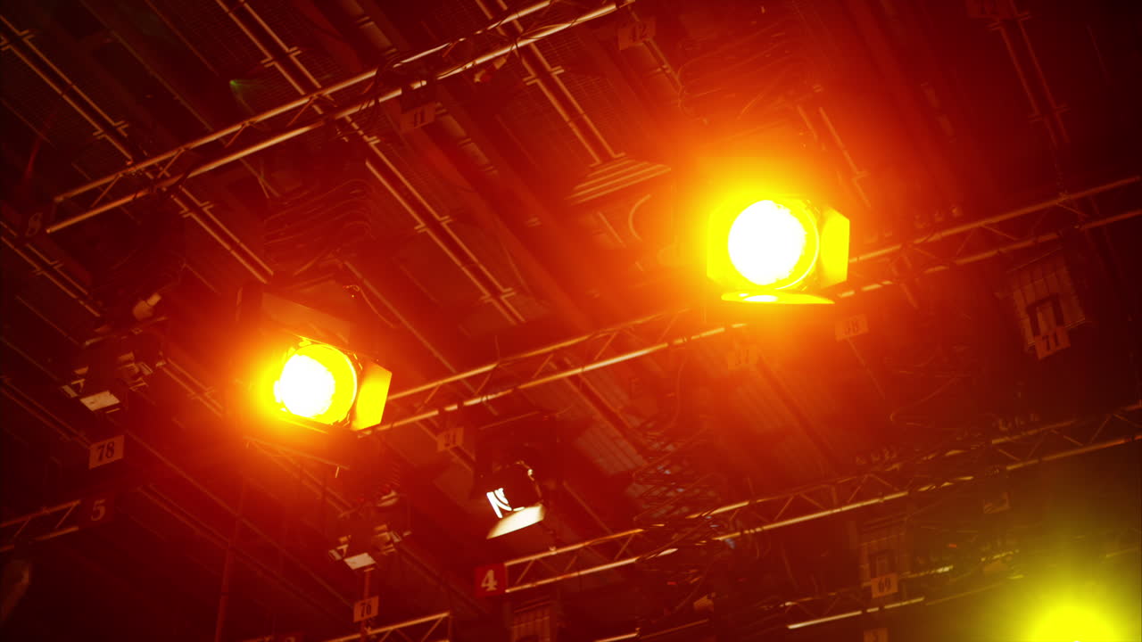 Flashing studio lights equipment on the ceiling of a TV set
